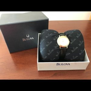 Bulova watch with black snake skin band